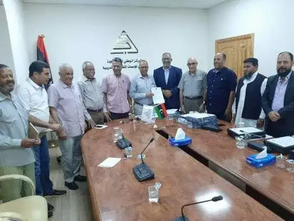 تسليم مستندات الاعتماد المؤسسي لكليتي العلوم – غريان والآداب – الأصابعة