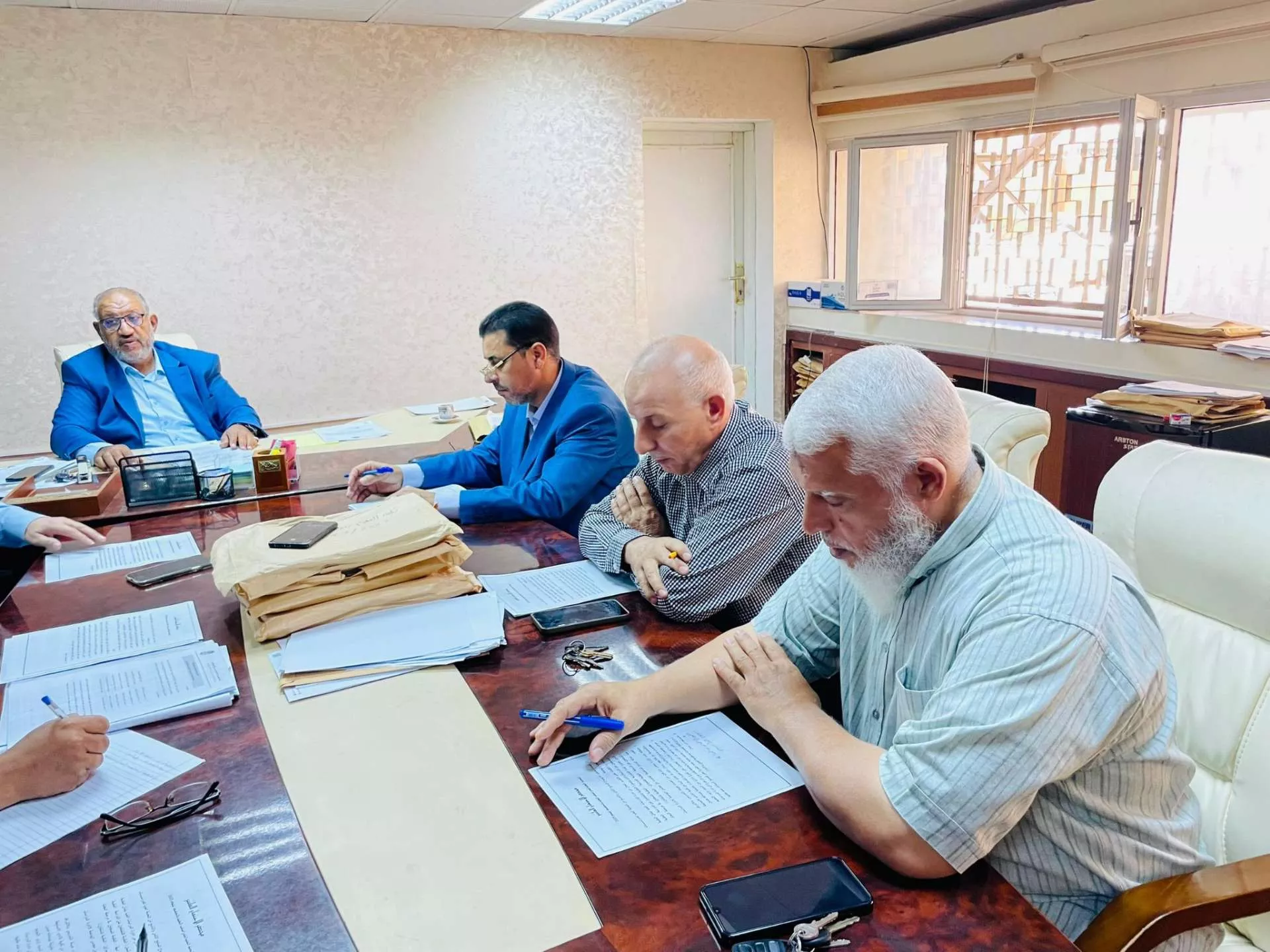 On Wednesday, October 22, 2025, at exactly 10:30 AM, the Supreme Committee for Graduate Studies held a meeting at the office of the University Vice President for Academic Affairs, with full attendance of committee members.